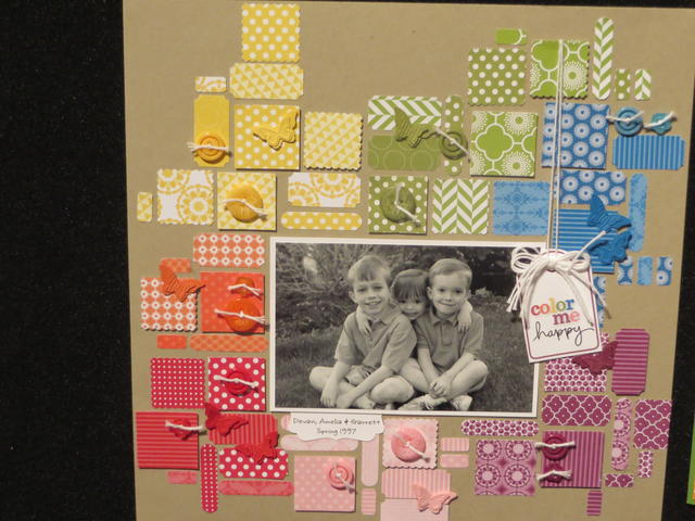 Designer Paper bits and pieces on a scrapbook page